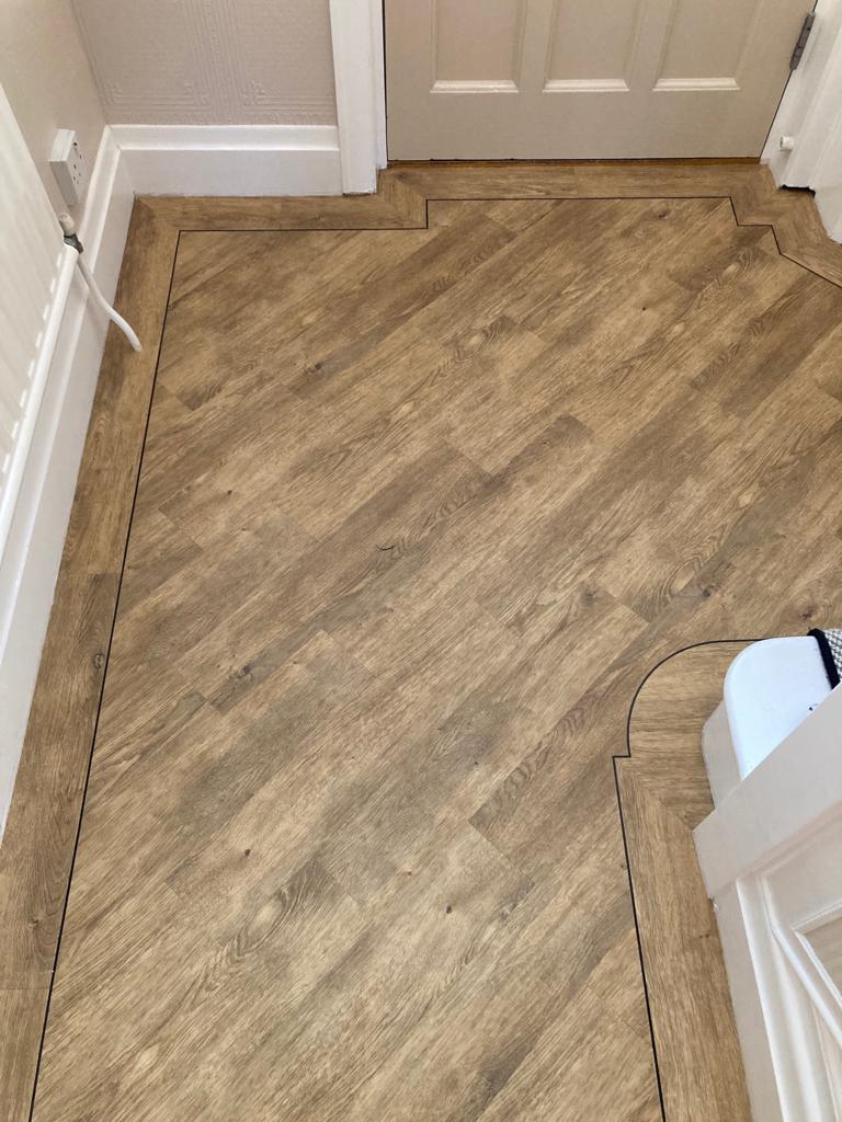 j2 Flooring Natural Timbers Standard Plank - Carpenters Oak - fitted on 45 degree with full tile border