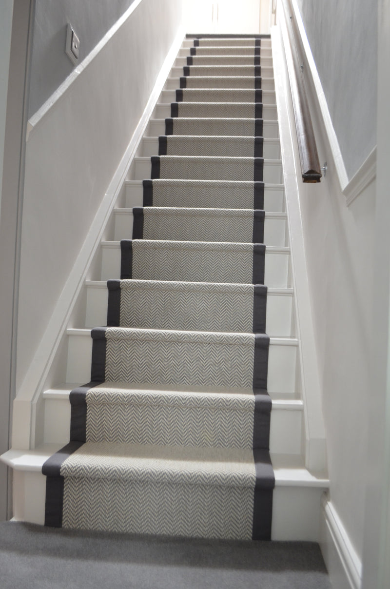 Fibre Flatweave Classics Herringbone Carpet - Chalk - fitted with Elephant colour tapes to staircase